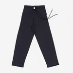 navy blue cotton cashmere pants with side pockets and a drawstring waist, laid flat.